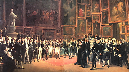 König Karl X. zeichnet im dicht behängten Salon Carré des Louvre Künstler aus, Gemälde von François-Joseph Heim aus dem Jahr 1827.